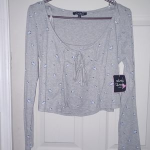 A large mixed threads gray shirt with blue flowers